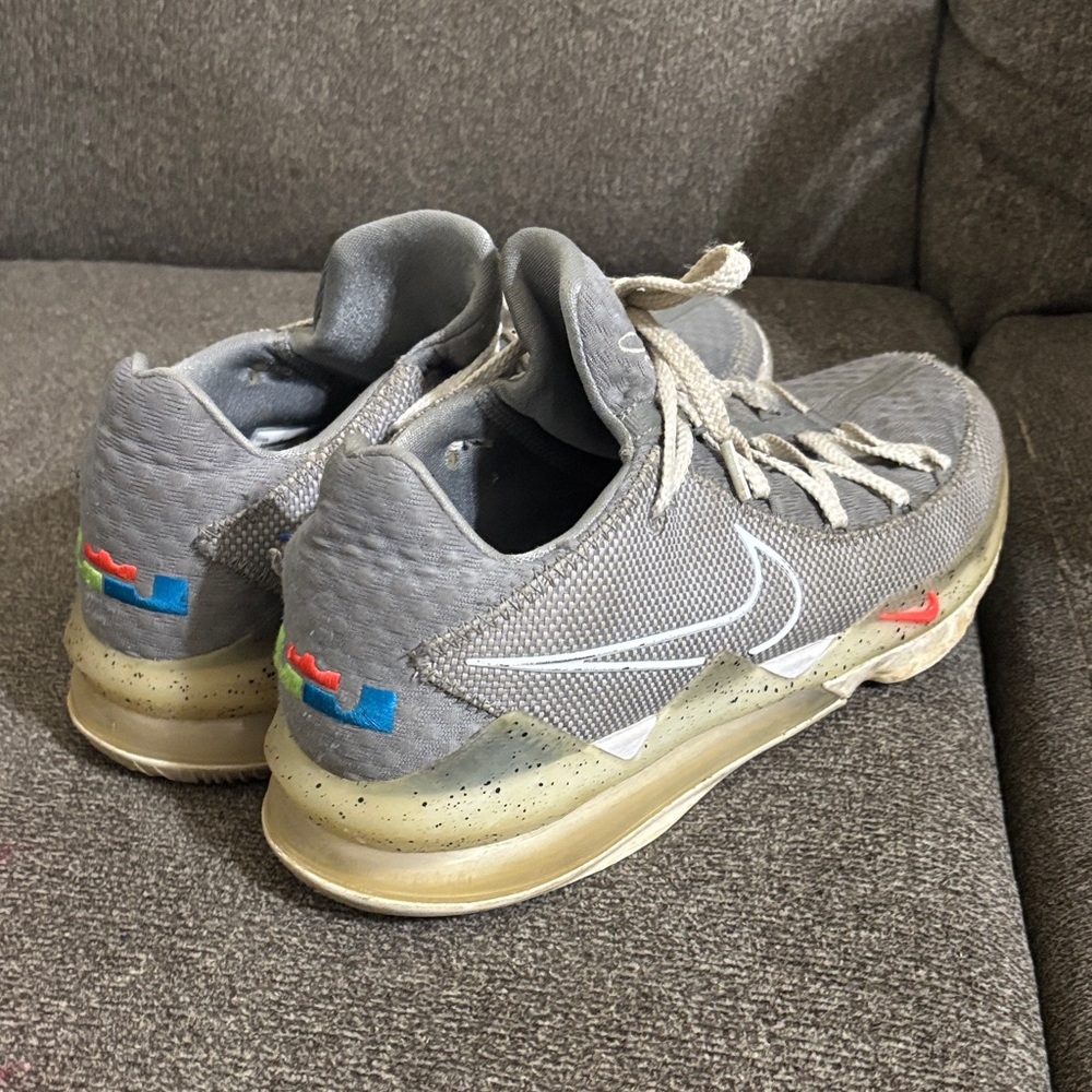 Nike Gray Athletic Sneakers with Red Accents